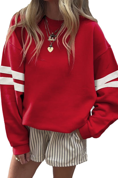 Pull oversized sportif pour femmes avec des accents rayés et une coupe décontractée Chic und Stil