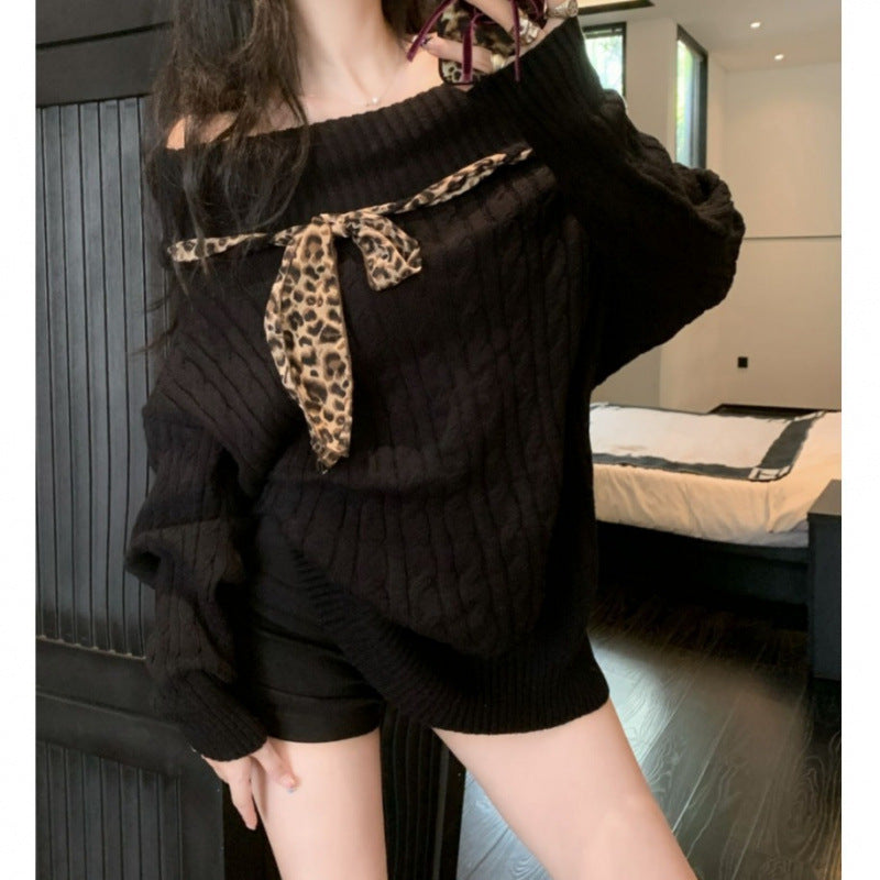 Pull en grosses mailles pour femmes avec épaule dénudée et accent de nœud ludique Chic und Stil