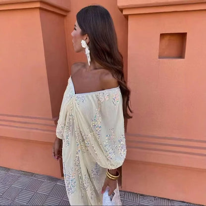 Robe maxi pour femmes avec de volumineuses manches bouffantes et un design en strass floral Chic und Stil