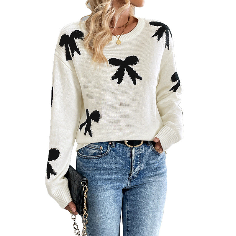 Dames Pull doux avec un motif nœud ludique Chic und Stil
