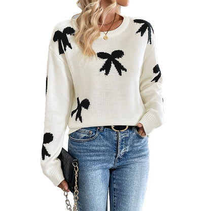 Dames Pull doux avec un motif nœud ludique Chic und Stil