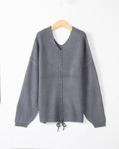 Pull femme en tricot épais avec un décolleté en V attrayant et des détails pratiques en cordon Chic und Stil