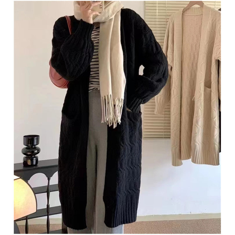 Cardigan en tricot pour femmes avec motif en relief et poches pratiques Chic und Stil