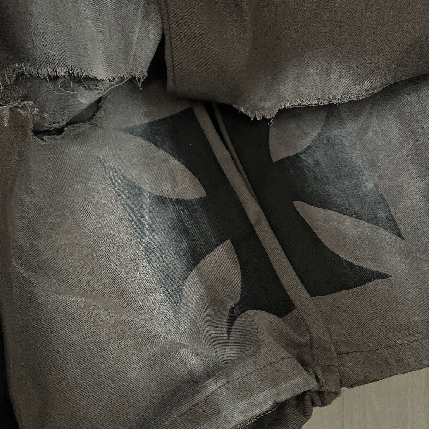 Casual women's pants with an oversized relaxed fit and trendy tear details Chic and Style