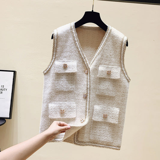 Women's vest with pockets and decorative button Chic und Stil