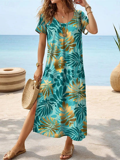 Robe maxi pour femmes avec un design élégant de feuilles tropicales et des fentes latérales Chic und Stil