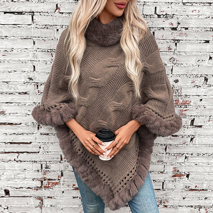 Dames pull-poncho douillet avec garniture en fausse fourrure douce et motif en torsades Chic und Stil
