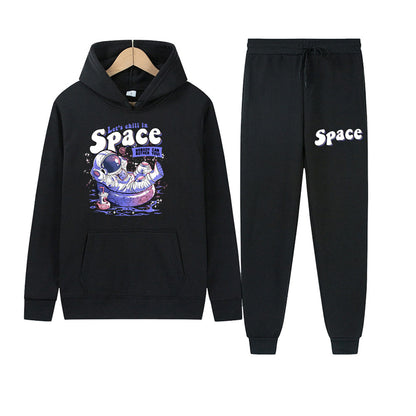 Casual ensemble for women with hoodie and jogger pants featuring creative astronaut print Chic and Style