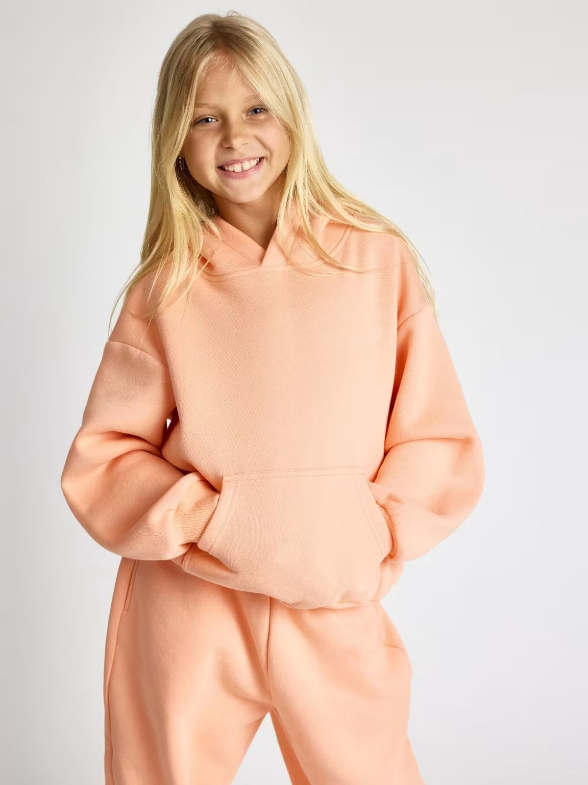 Pull à capuche confortable pour femmes avec poche kangourou et manches larges Chic und Stil