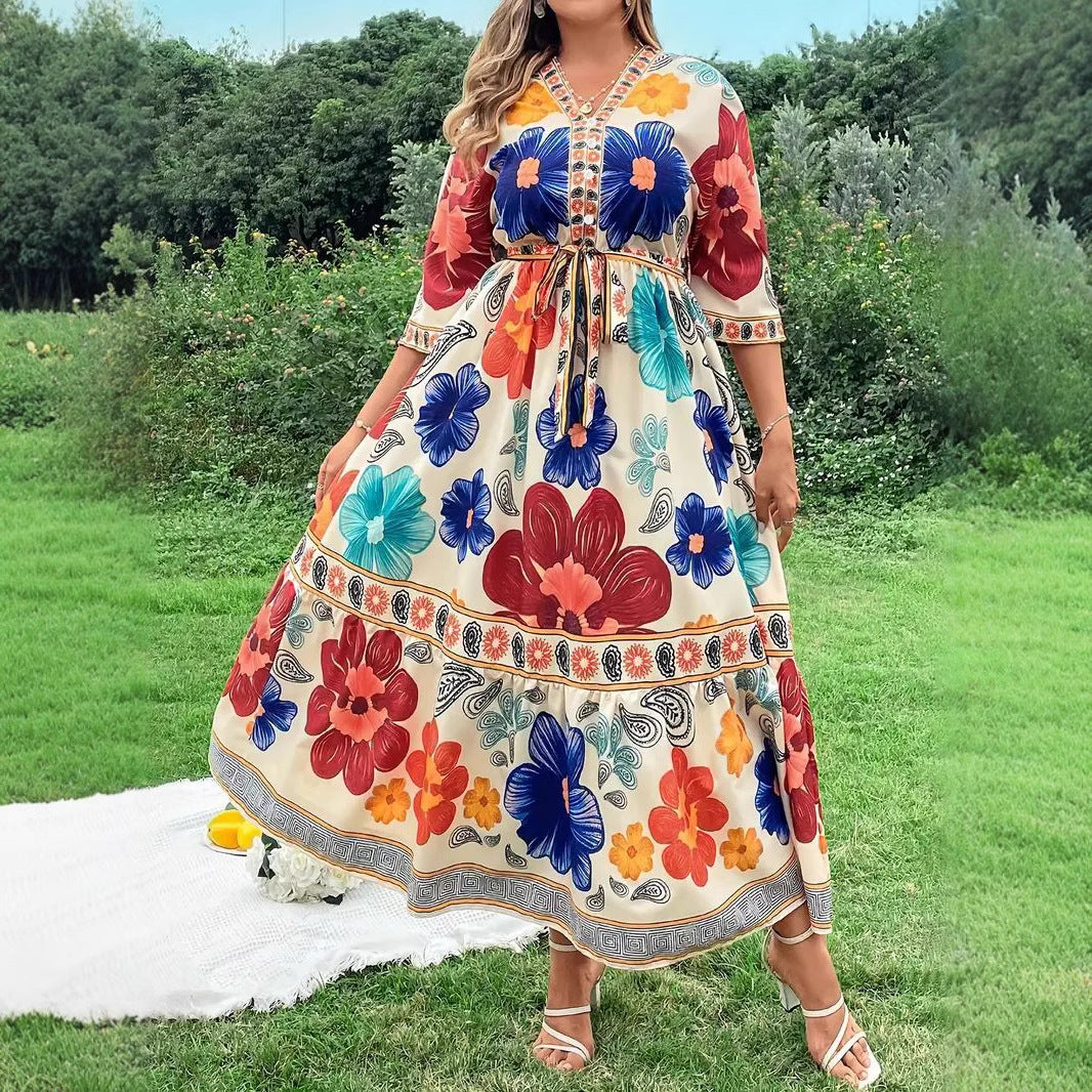 Robe maxi femme avec design floral coloré et ceinture à la taille Chic und Stil