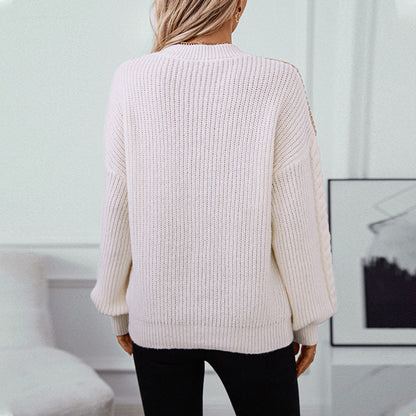 Pull en maille tendance pour femmes avec des manches à motif torsadé raffiné et des couleurs contrastées Chic und Stil