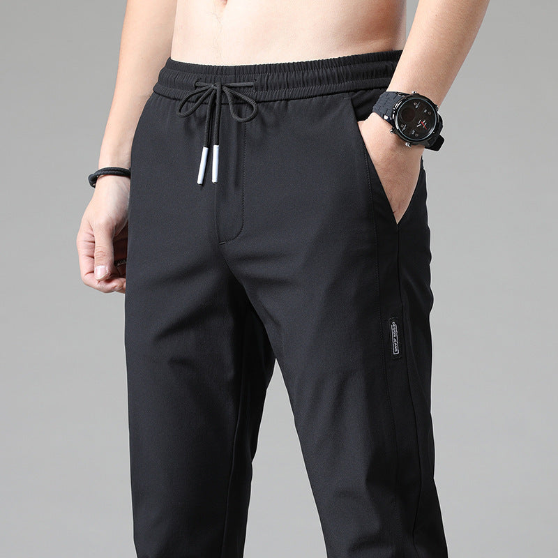 Men's sports pants with adjustable drawstring and zippered pockets on the sides Chic and Style