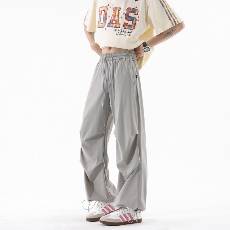 Loose sports pants for men with a remarkable draped design Chic and Style