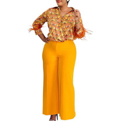 Expressive outfit for women with printed blouse and wide pants Chic and Style