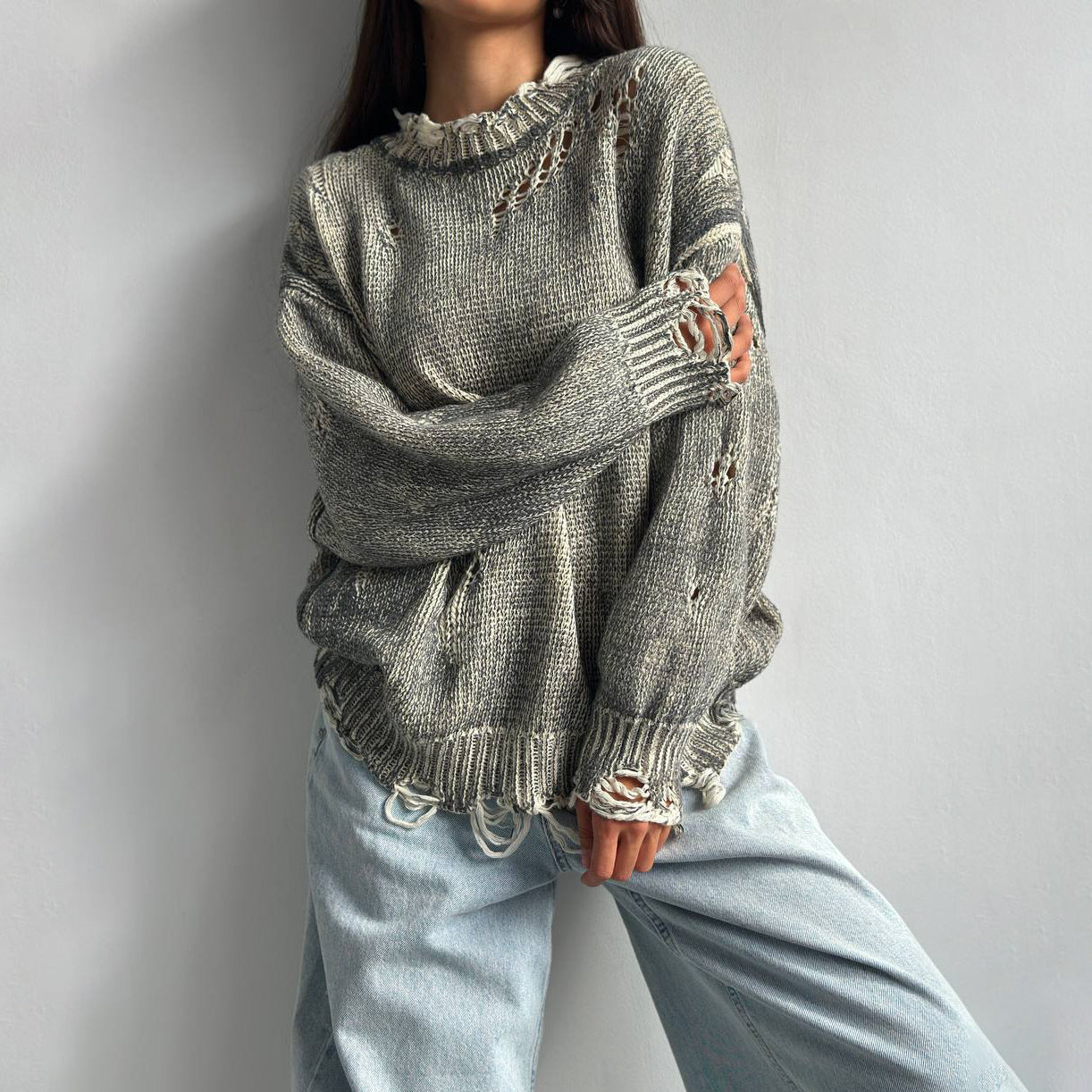 Ladies oversized knitted casual pullover with a unique hole pattern Chic and Style
