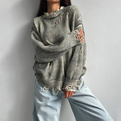 Ladies oversized knitted casual pullover with a unique hole pattern Chic and Style
