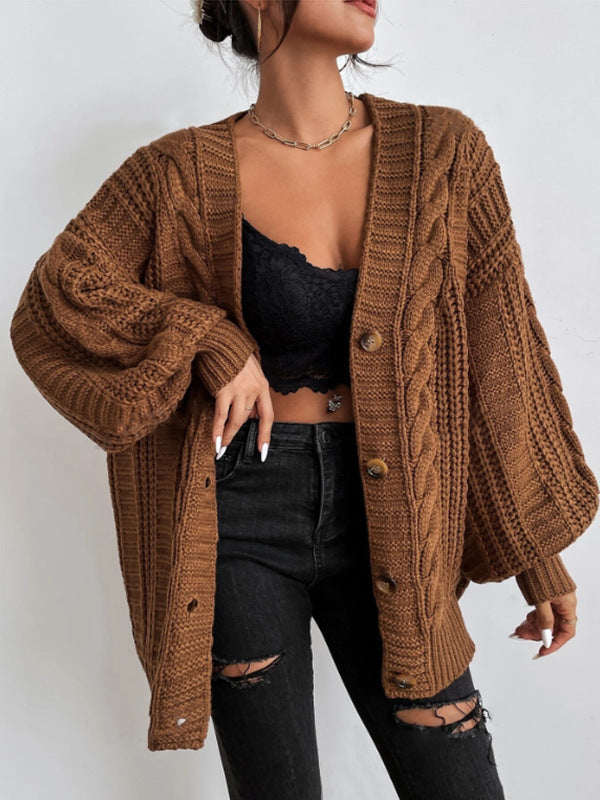 Dames grosse tricot cardigan avec des manches larges et des détails de boutons Chic und Stil