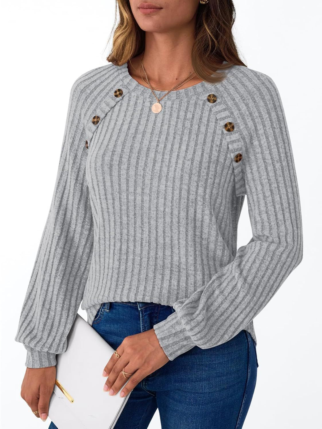 Pull-over en tricot pour femmes avec des boutons décoratifs et un motif côtelé moderne Chic und Stil