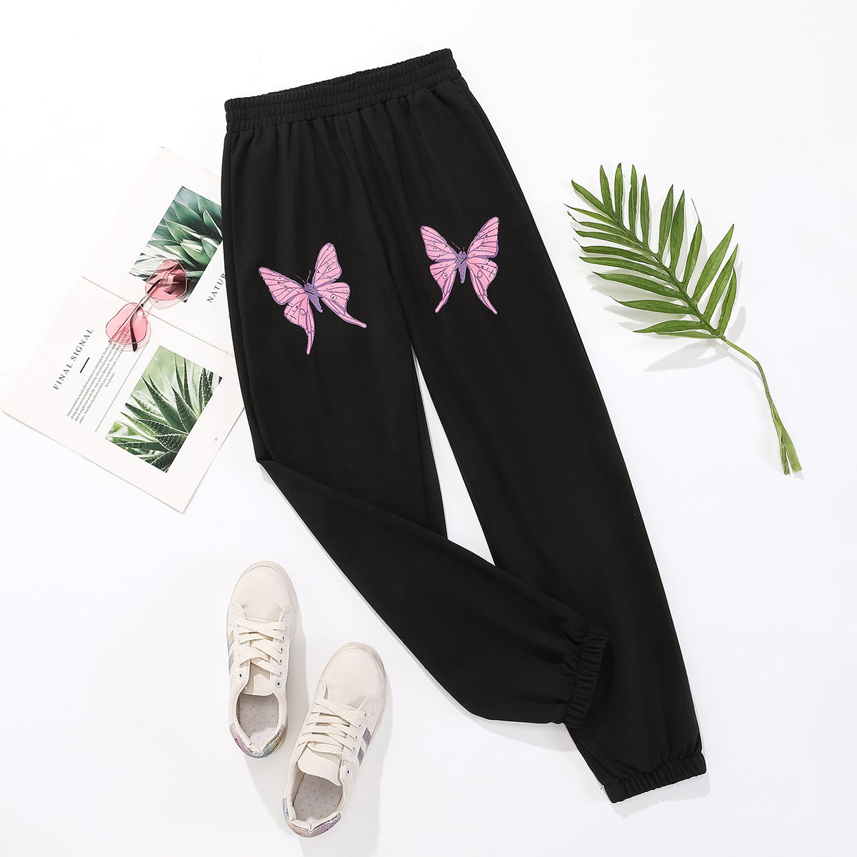 Women's sports pants with colorful butterfly details Chic and Style