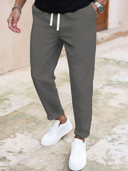 Casual pants for men with elastic waistband and practical pockets Chic and Style