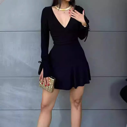 Robe portefeuille pour femmes avec manches longues et nœuds décoratifs Chic und Stil