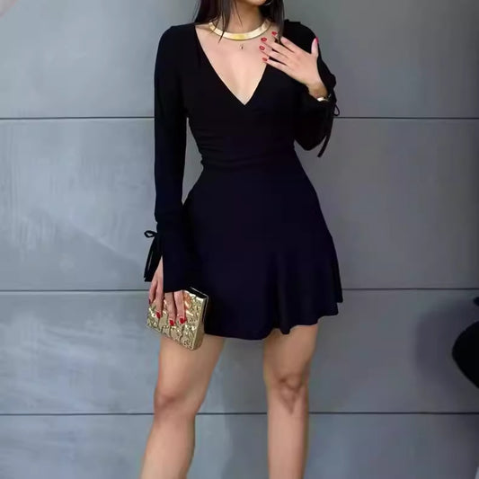Robe portefeuille pour femmes avec manches longues et nœuds décoratifs Chic und Stil