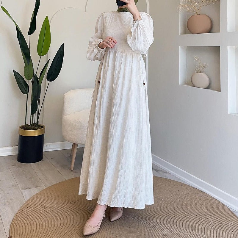 Robe maxi pour femmes avec un design plissé élégant et des manches bouffantes longues Chic und Stil