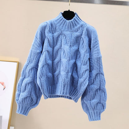 Pull en tricot confortable pour femmes avec des manches volumineuses et un motif torsadé Chic und Stil