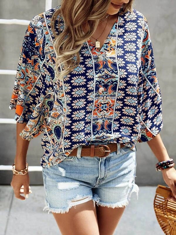 Dames haut léger ample avec motif floral et décolleté en V Chic und Stil