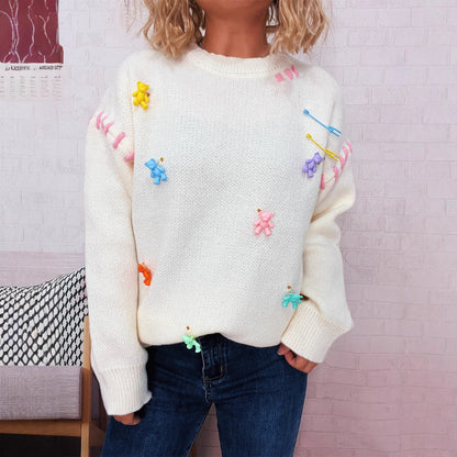 Pull femme avec motif de ours ludique et appliqués décoratifs Chic und Stil