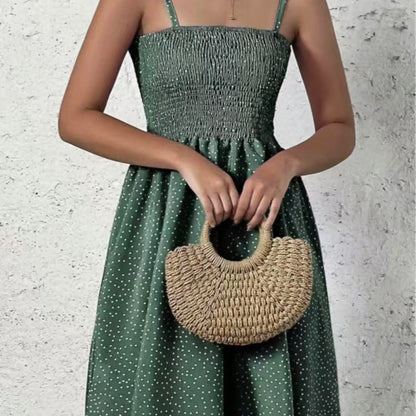 Robe à col halter pour femmes avec une silhouette aérienne et un joli motif à pois Chic und Stil