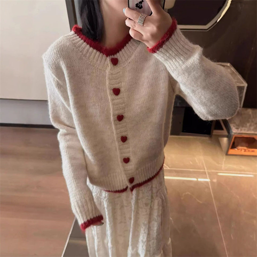 Dames gilet en tricot douillet avec boutons en forme de cœur et conception de manches raffinée Chic und Stil