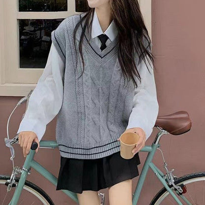 Pull en tricot pour femmes avec décolleté en V et motif de tresses géométriques Chic und Stil