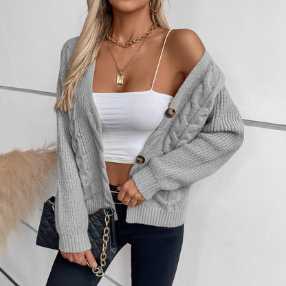 Cardigan pour femmes avec motif en torsade et détails de boutons Chic und Stil