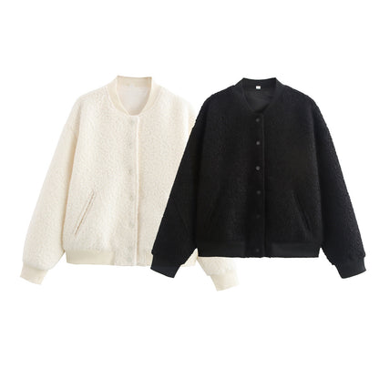 Dame veste en polaire avec tissu texturé et fermeture à bouton pratique Chic und Stil