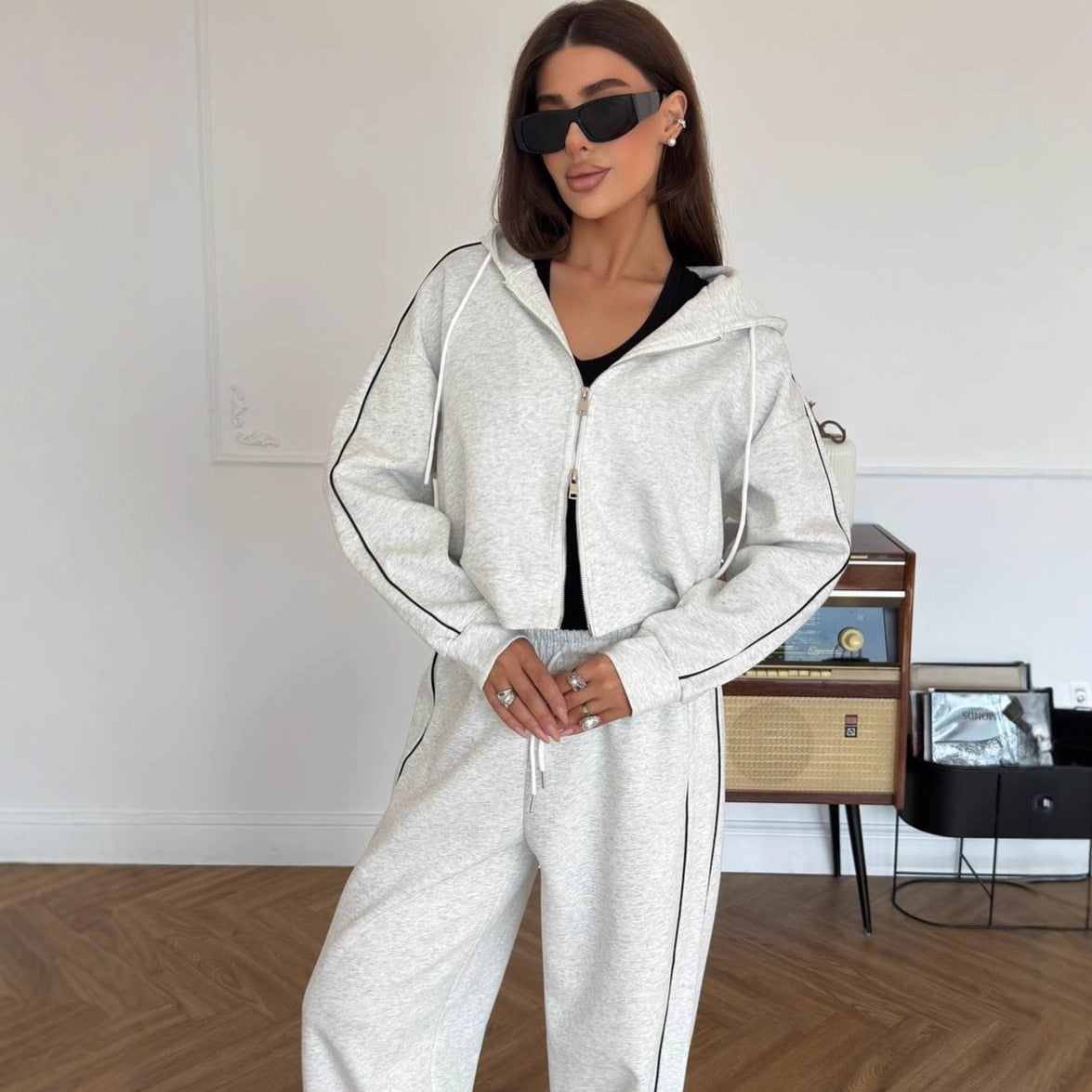 Women's comfortable hoodie and wide-leg sports pants with chic and stylish side accents