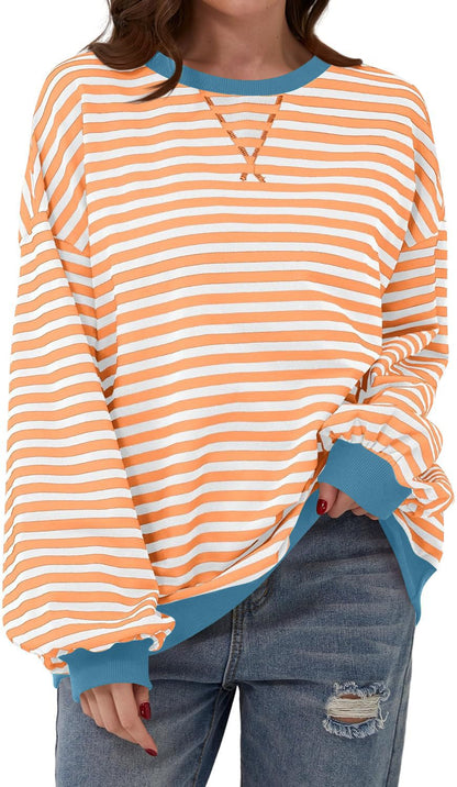 Femme pull décontracté avec motif rayé saisissant et bords élastiques Chic und Stil