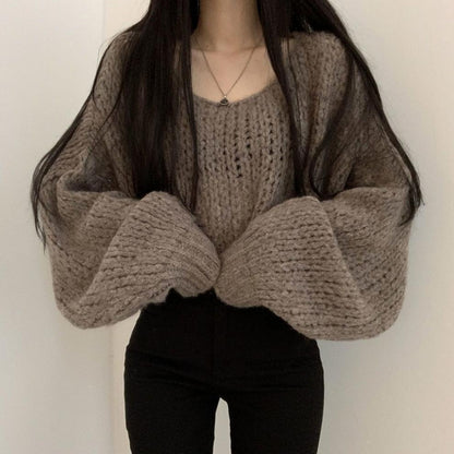 Pull en tricot décontracté pour femmes avec des manches bouffantes volumineuses et une structure en tricot ouverte Chic und Stil
