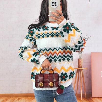 Dames gros tricot pull avec motif zigzag coloré et accents floraux Chic und Stil