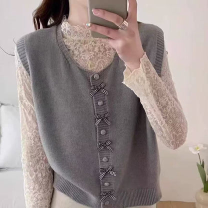 Pull en tricot tendance pour femmes avec grand col et nœuds décoratifs Chic und Stil