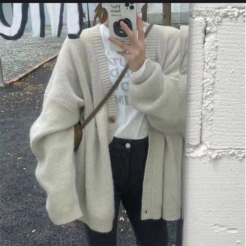 Dames gilet en tricot confortable avec épaules tombantes et détails de boutons Chic und Stil