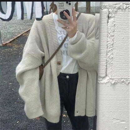 Dames gilet en tricot confortable avec épaules tombantes et détails de boutons Chic und Stil