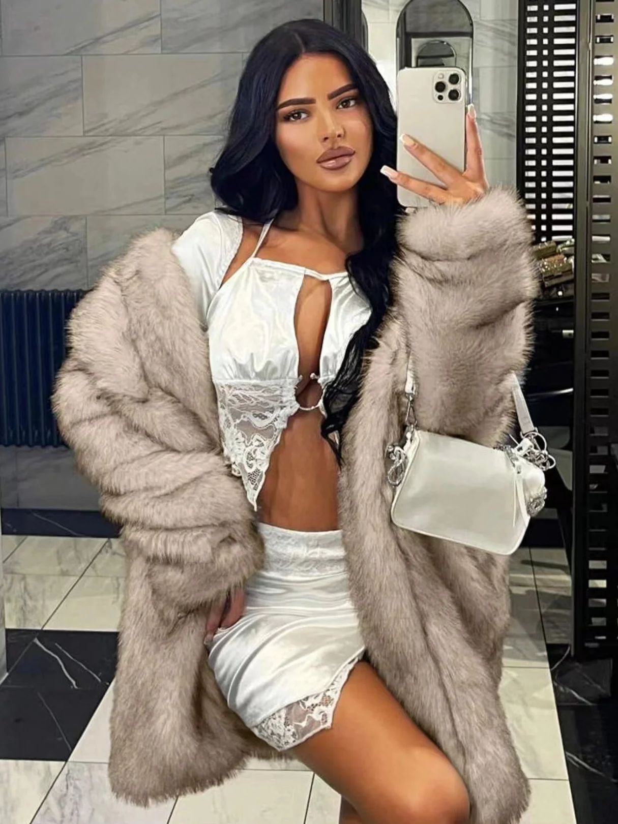 Ladies luxurious faux fur coat with open sleeves Chic and Style