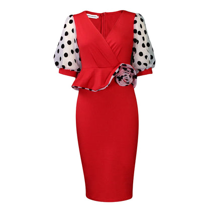 Robe de cocktail cintrée pour femmes avec manches bouffantes transparentes et accent floral Chic und Stil