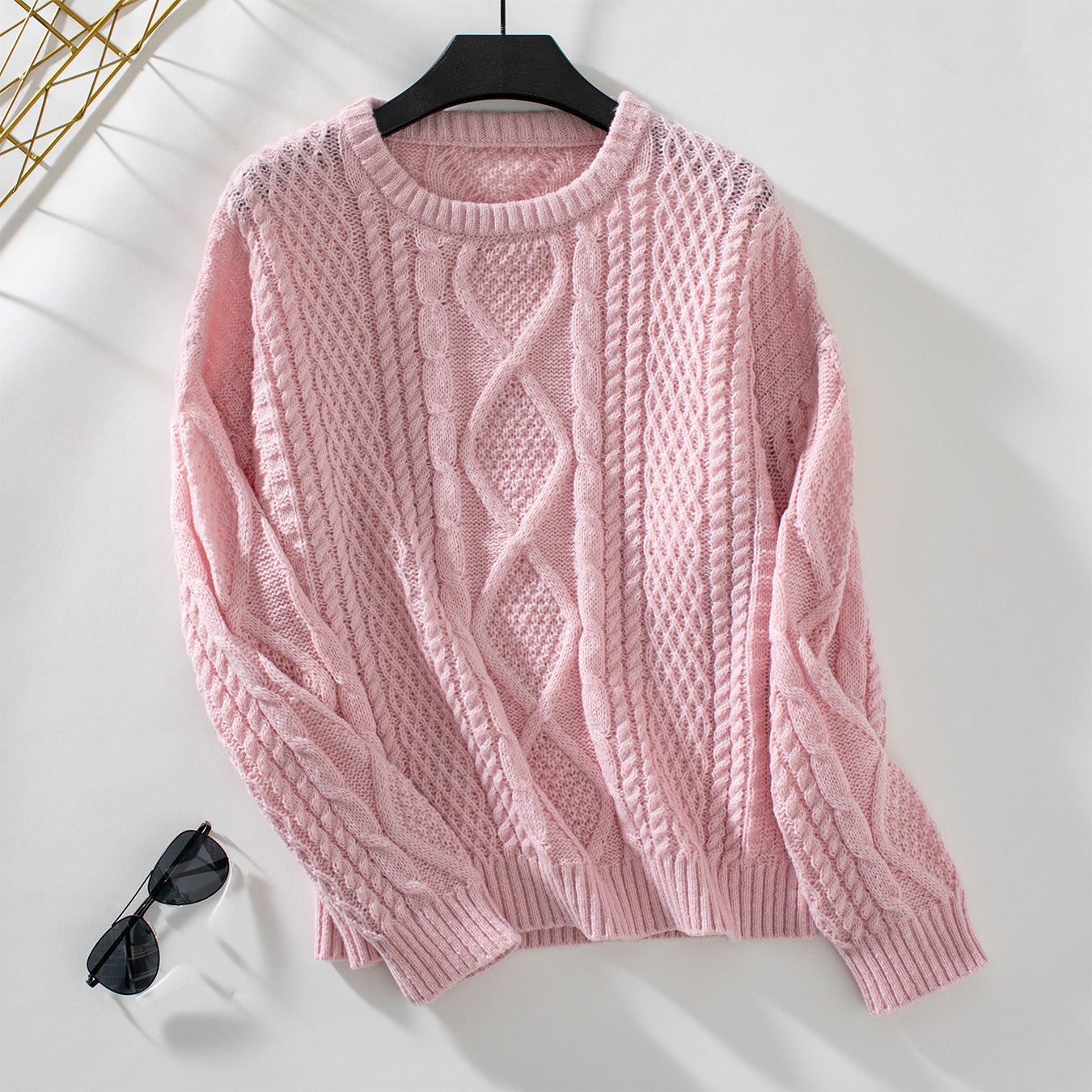 Pull en tricot pour femmes avec design en torsades texturées et col rond Chic und Stil