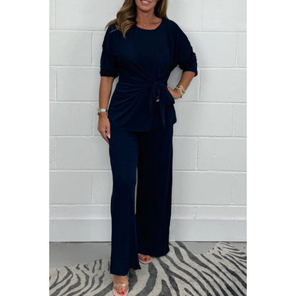 Elegant set for women in a fluid and soft material with a fitted top and loose pants Chic und Stil