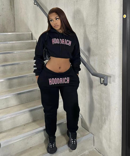 Men's sporty hoodie and jogger pants set with trendy inscription Chic und Stil