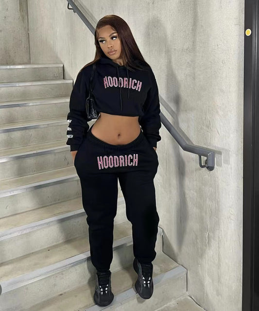 Men's sporty hoodie and jogger pants set with trendy inscription Chic und Stil