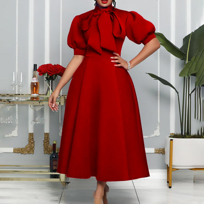 Robe maxi élégante pour femme avec des manches bouffantes volumineuses et un col à nœud Chic und Stil