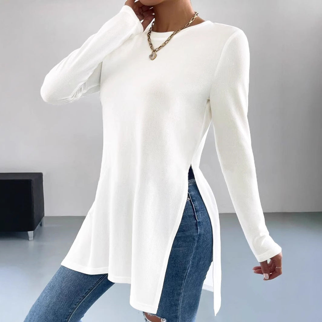 Asymmetrical women's top with long sleeves, side slits, and relaxed fit Chic and Style